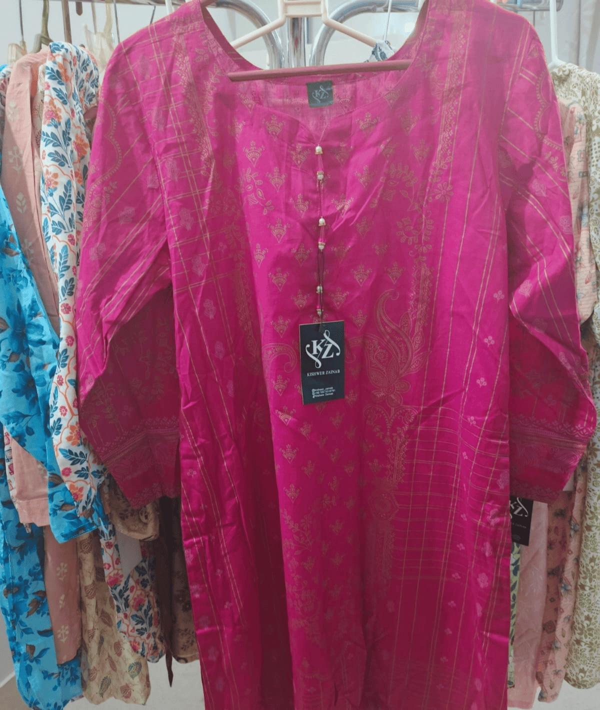 Kishwer Zainab – Magenta Self-Printed Kurti with Golden Detailing